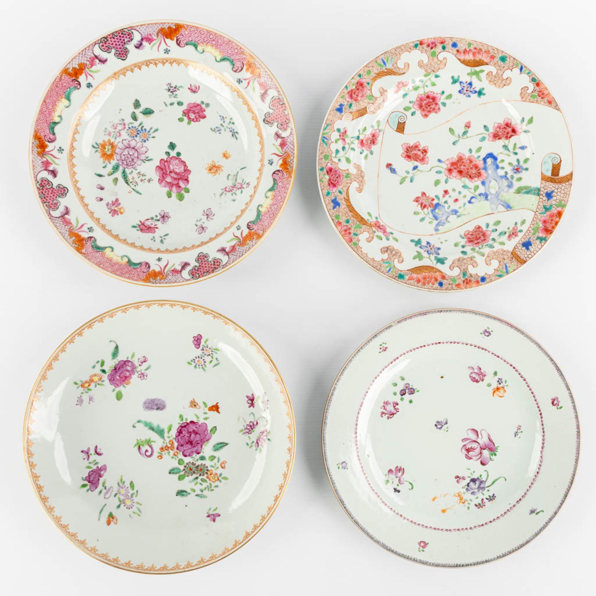 Ten Chinese Famille Rose plates and cups, flower decor. (D:23,5 cm) - Image 6 of 13