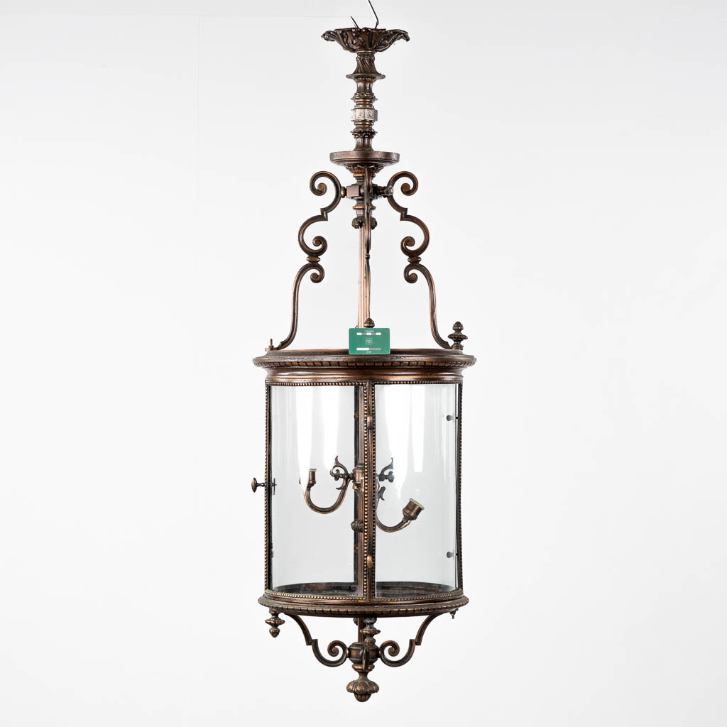 A large lantern, patinated metal and glass. Circa 1900. (H:144 x D:45 cm) - Image 2 of 12