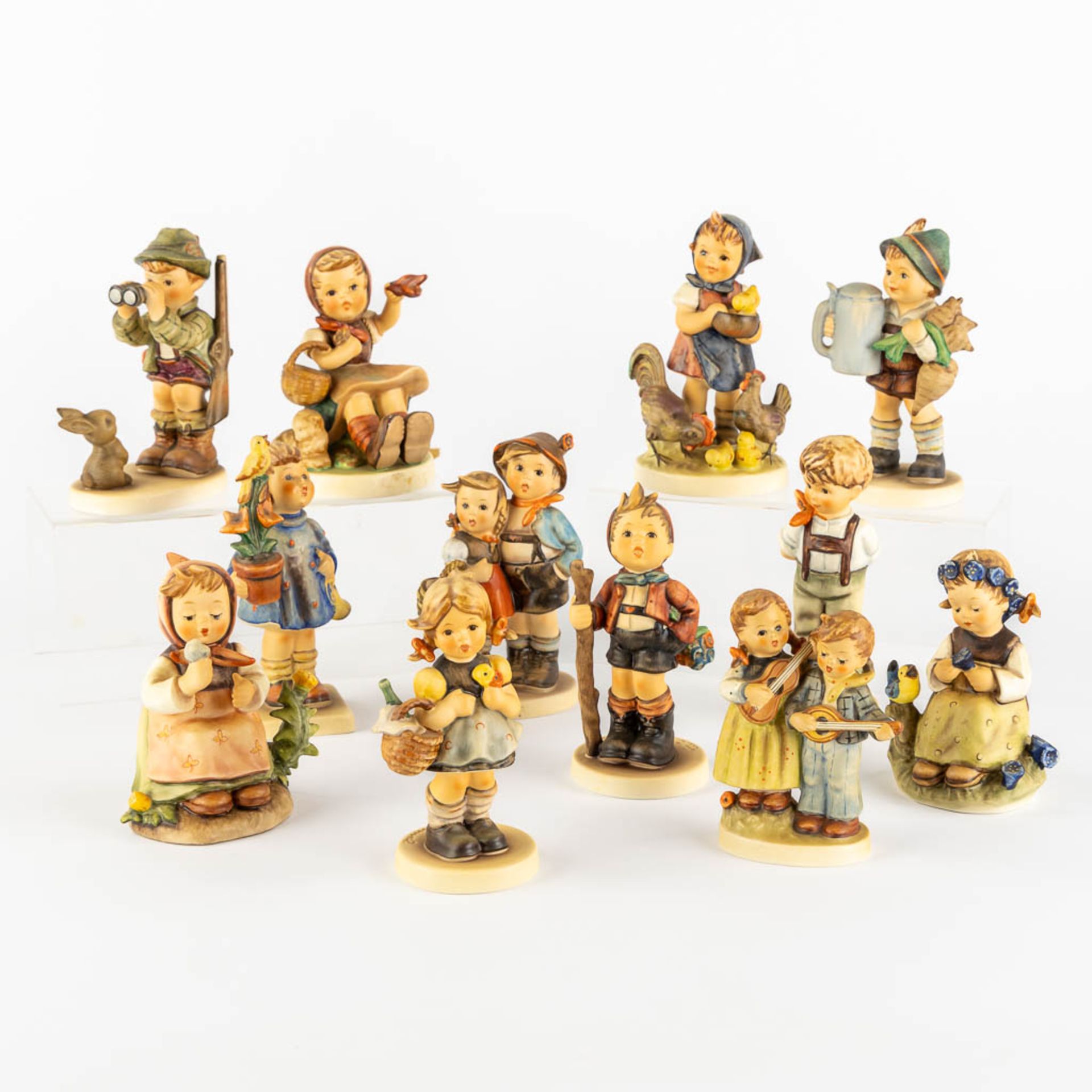 Hummel, 12 figurines, polychrome porcelain. (H:15 cm)