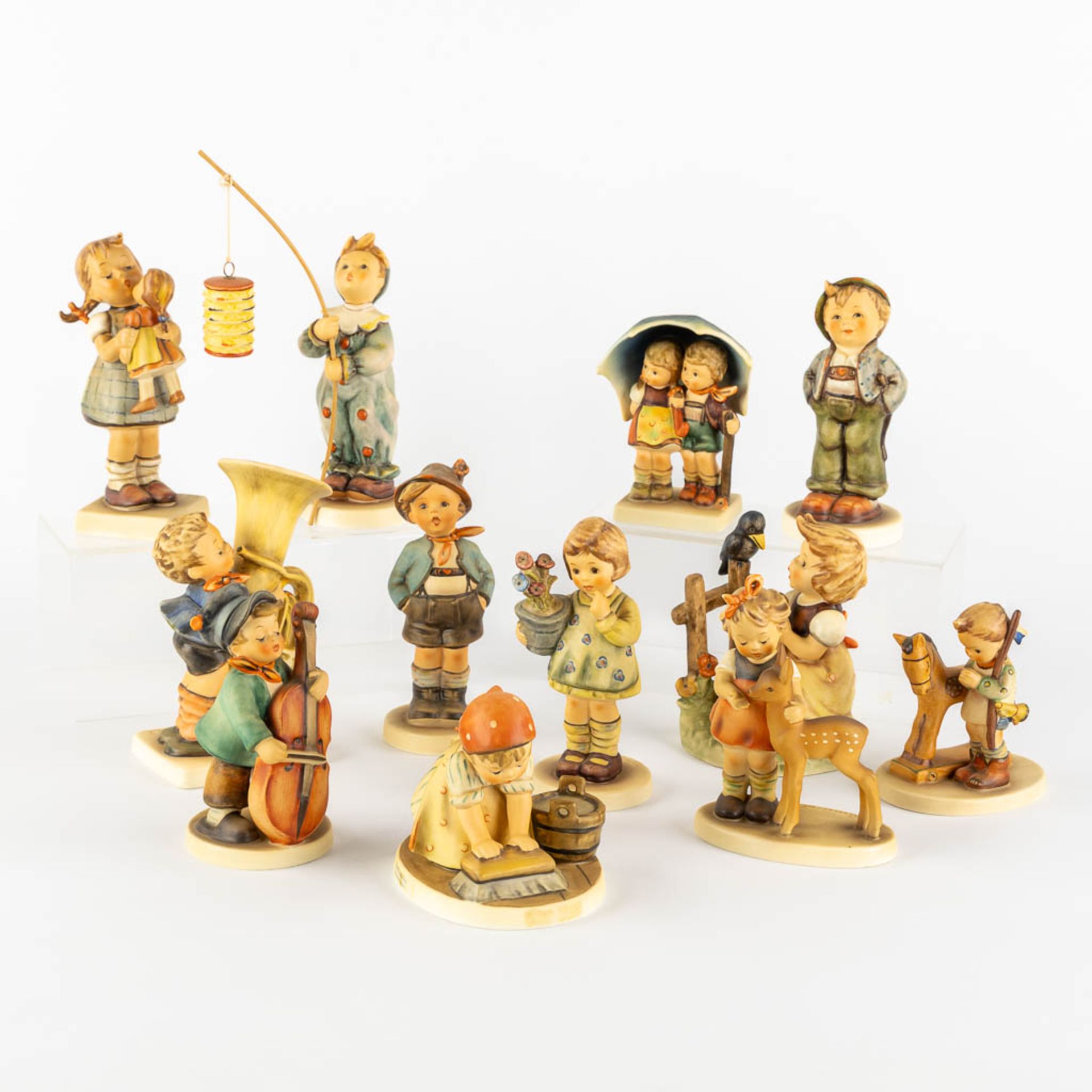 Hummel, 12 figurines, polychrome porcelain. (H:21 cm)