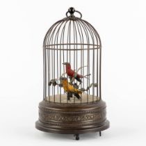 A brass bird-cage automata with two singing birds. (H:28 x D:16 cm)