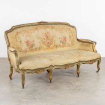 A Louis XV style sofa, upholstered with flower embroideries. (L:80 x W:175 x H:96 cm)