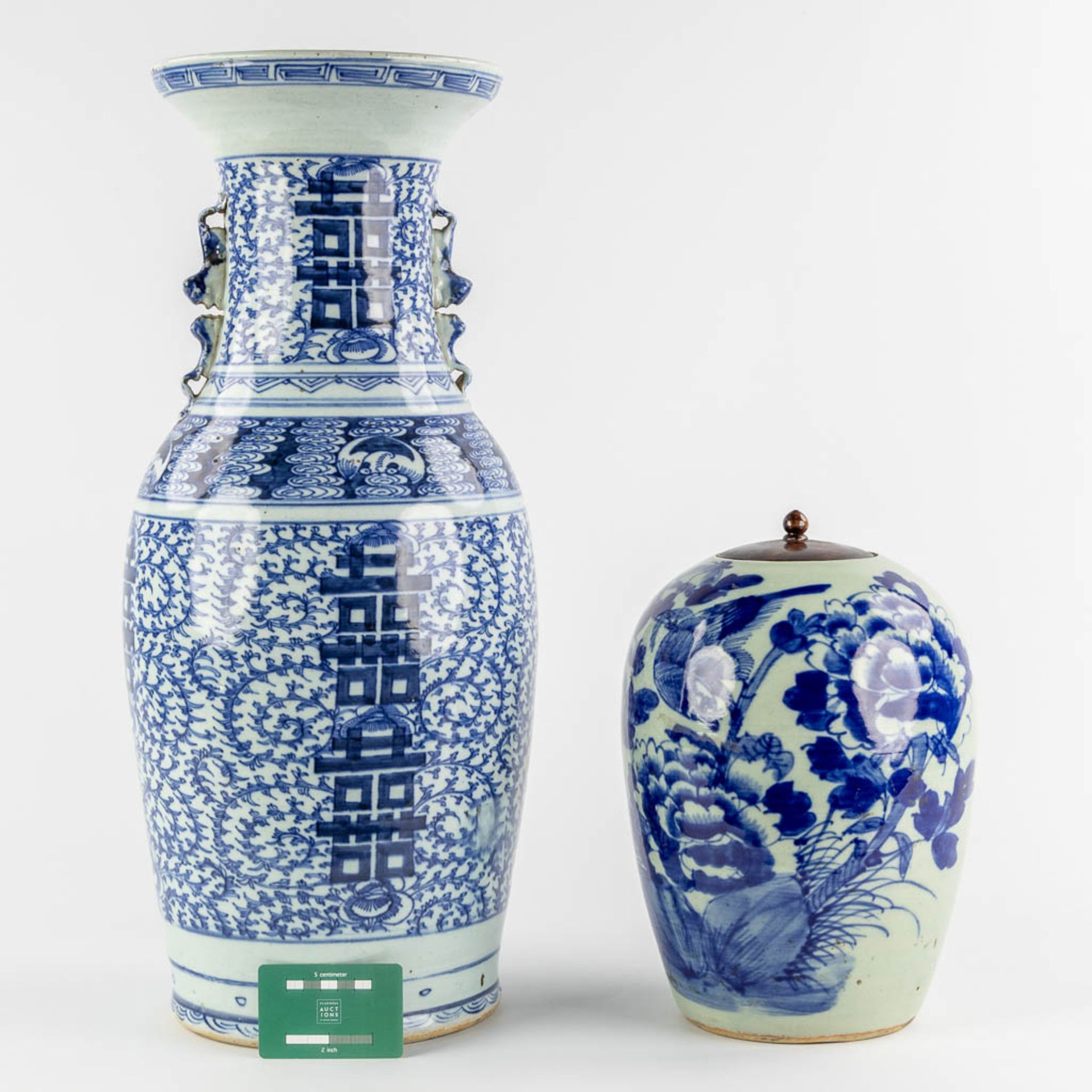 A Chinese celadon vase and ginger jar with a blue-white Double Xi and Floral decor. 19th/20th C. (H: - Image 2 of 11