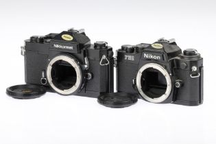 A Black Nikon FE2 and a FT3 35mm SLR Bodies