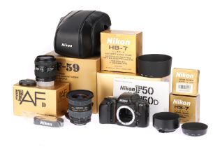 A Nikon F50 35mm SLR Camera & Lenses,