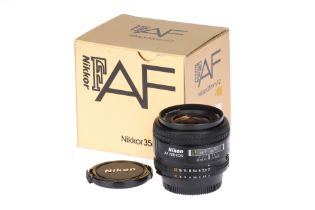 A Nikon AF Nikkor f/2 35mm Camera Lens,