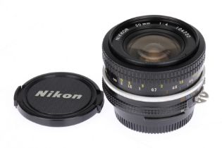 A Nikon Ai Nikkor f/4 20mm Lens,