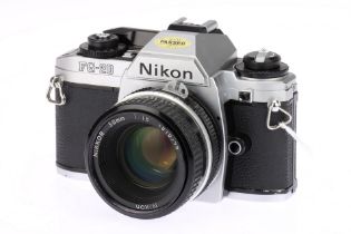 A Nikon FG-20 35mm Film SLR Camera,