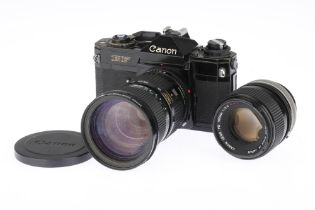 A Canon EF 35mm SLR Camera and Two Lenses