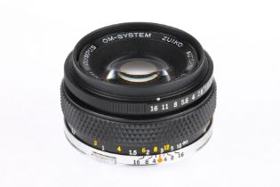 An Olympus Zuiko Auto-S f/1.8 50mm Camera Lens,