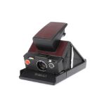 A Polaroid SX-70 Land Model 2 Instant Folding SLR Camera