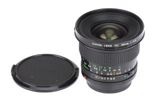 A Canon Lens FD f/2.8 20mm Camera Lens,