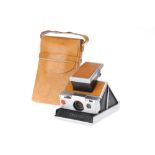 A Polaroid SX-70 Land Instant Folding SLR Camera