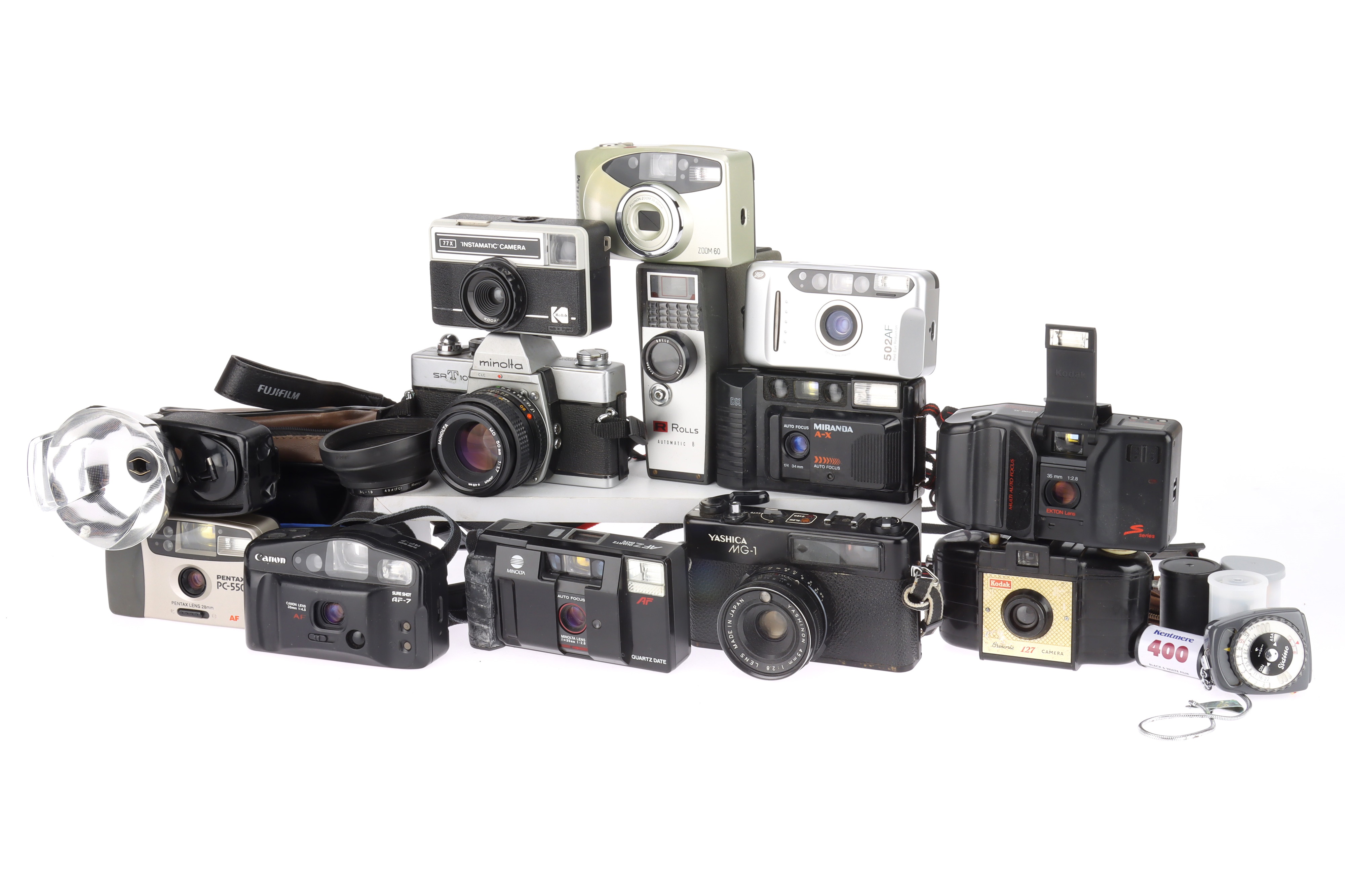 A Minolta SRT101 SLR and Various Compact Film Cameras