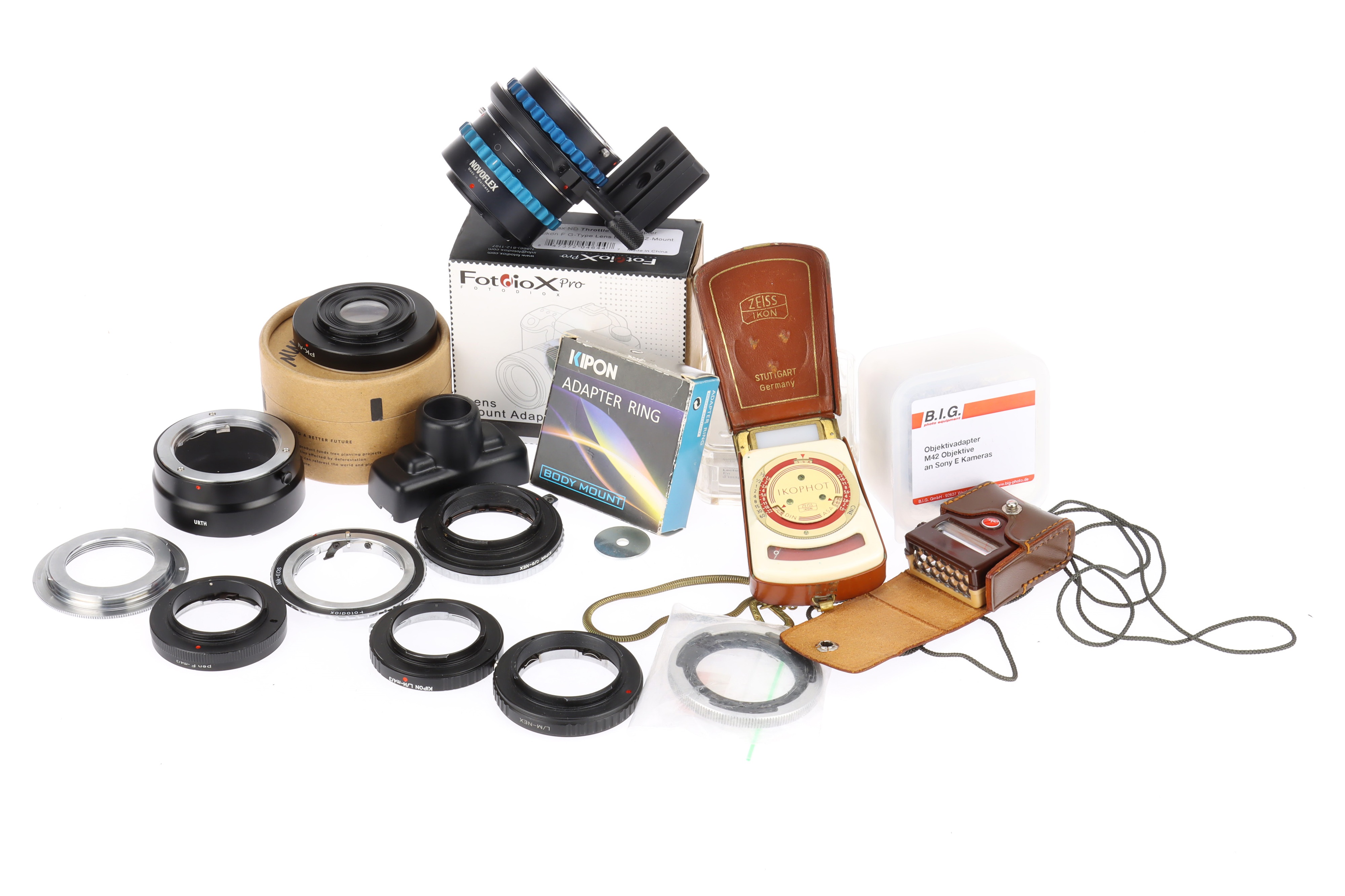 A Collection of Various Camera Lens Adapters and Accessories