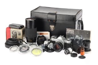 A Mixed Selection of Cameras, Lenses, & Accessories,