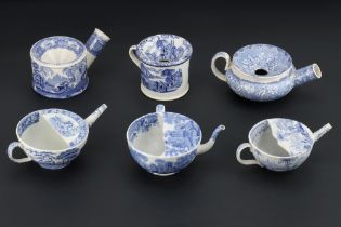A Group of Blue and White Earthenware Spittoons and Feeding Cups,