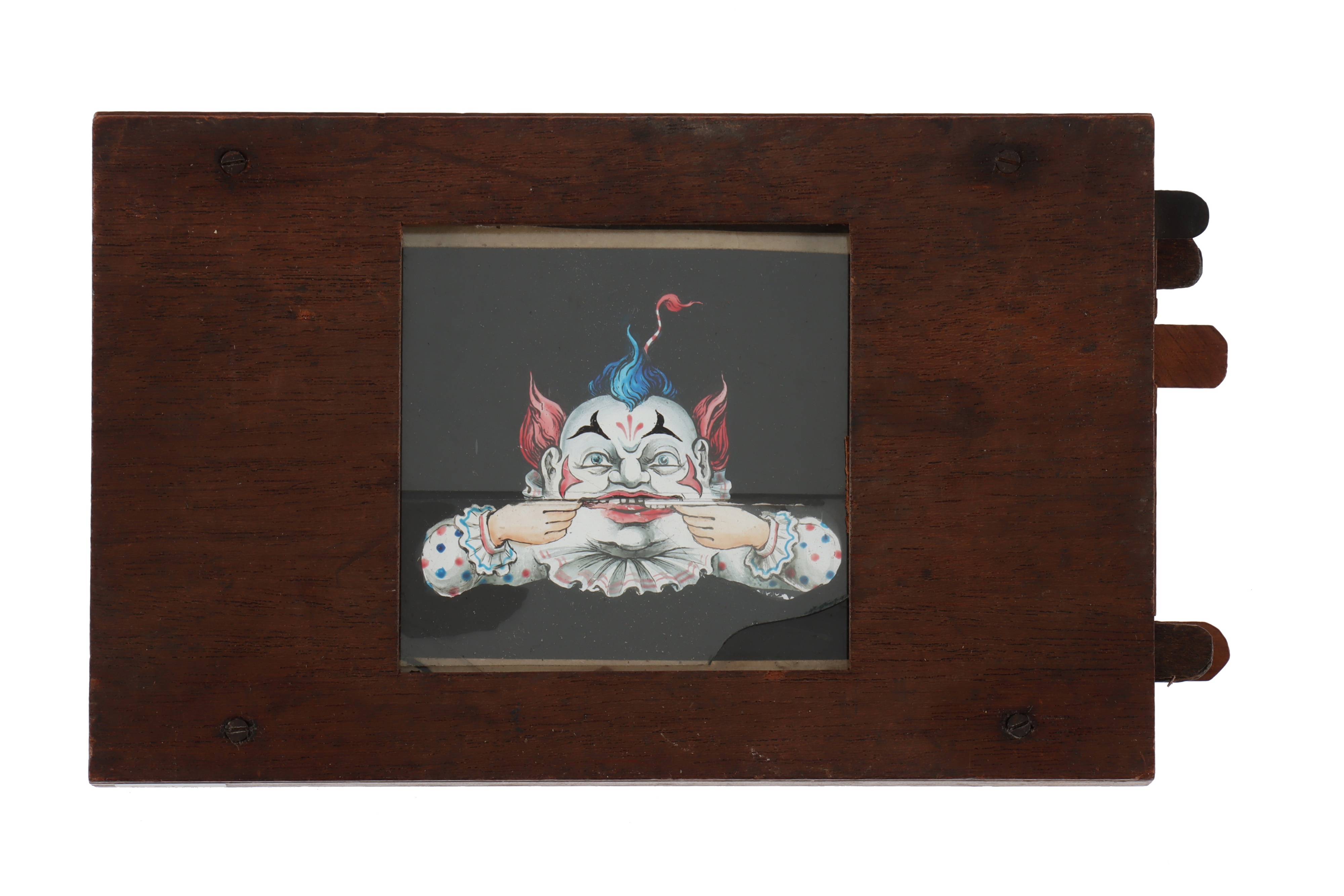 A Complex Magic Lantern Slide of a Clowns Face,