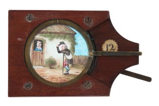 An Unusual Double Action Hand-painted Magic Lantern Lever Slide,