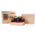 A Nikon FA Gold 'Grand Prix '84' SLR Camera,