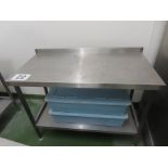 STAINLESS STEEL TABLE WITH SHELF.