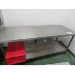 STAINLESS STEEL TABLE WITH SHELF AND SMALL DRAWER.