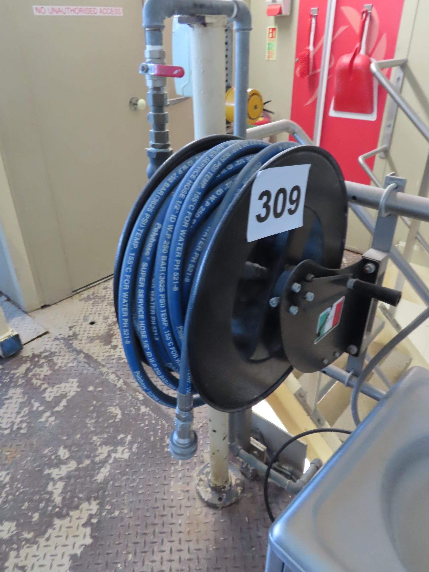 WALL MOUNTED HOSE REEL.