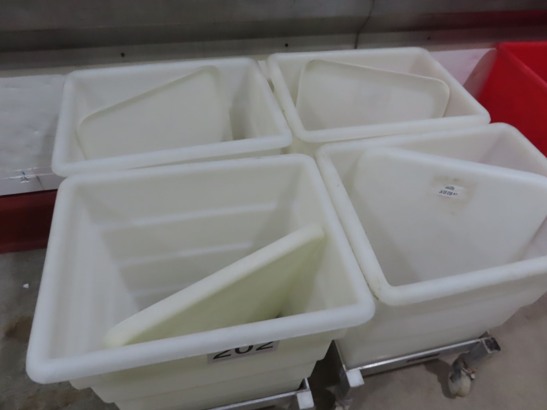 4 X WHITE PLASTIC BINS WITH LIDS ON SYSPAL DOLLIES. - Image 2 of 2