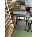 CASH REGISTER ON STAND.