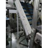 INCLINE FLIGHTED BELT CONVEYOR.