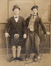 Chaplin (Sir Charles, "Charlie", film actor and director, 1889-1977) and Sir Harry Lauder. Photog...