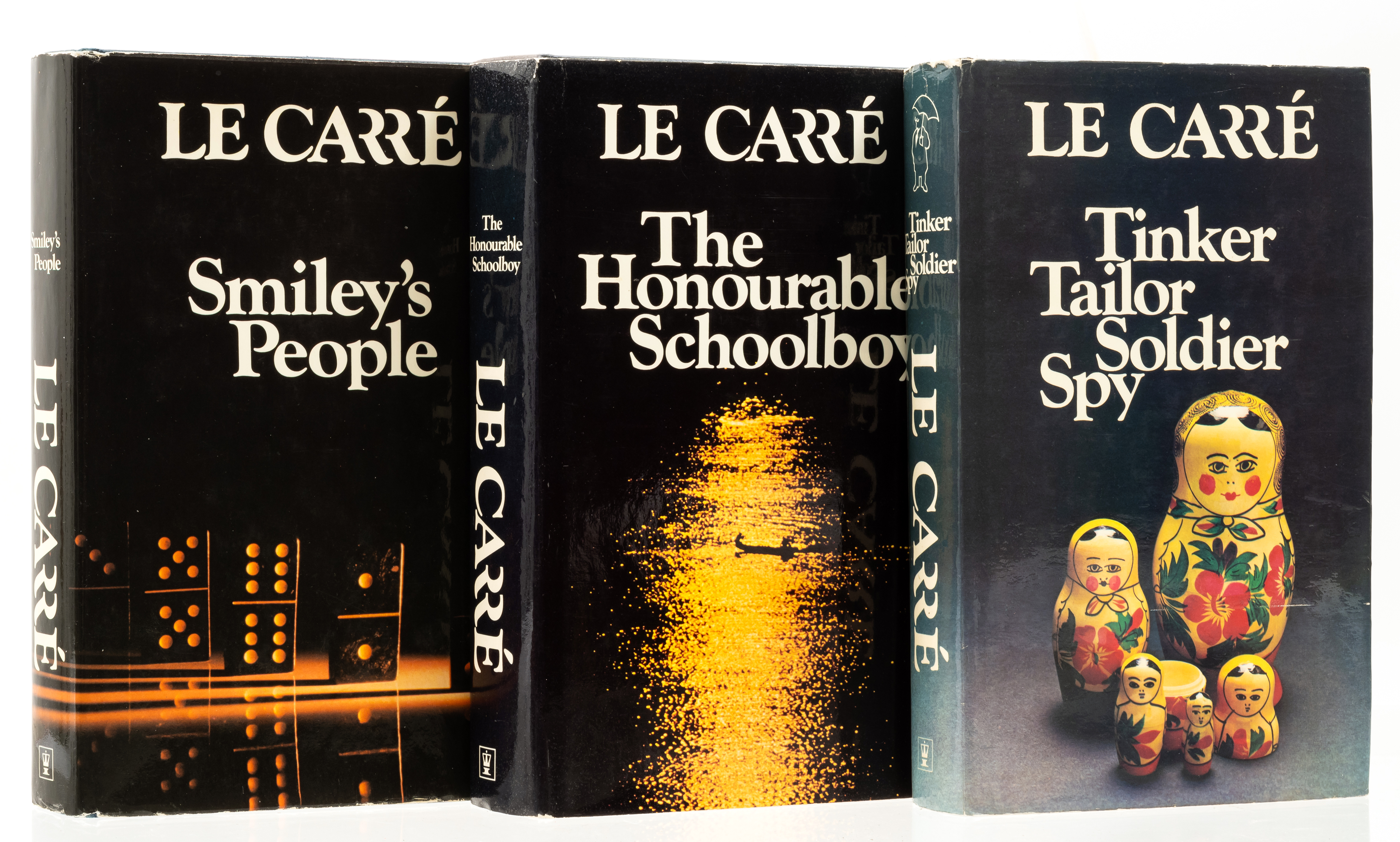 le Carré (John) [The Karla Trilogy], first editions, cut signatures or signed bookplates from the...