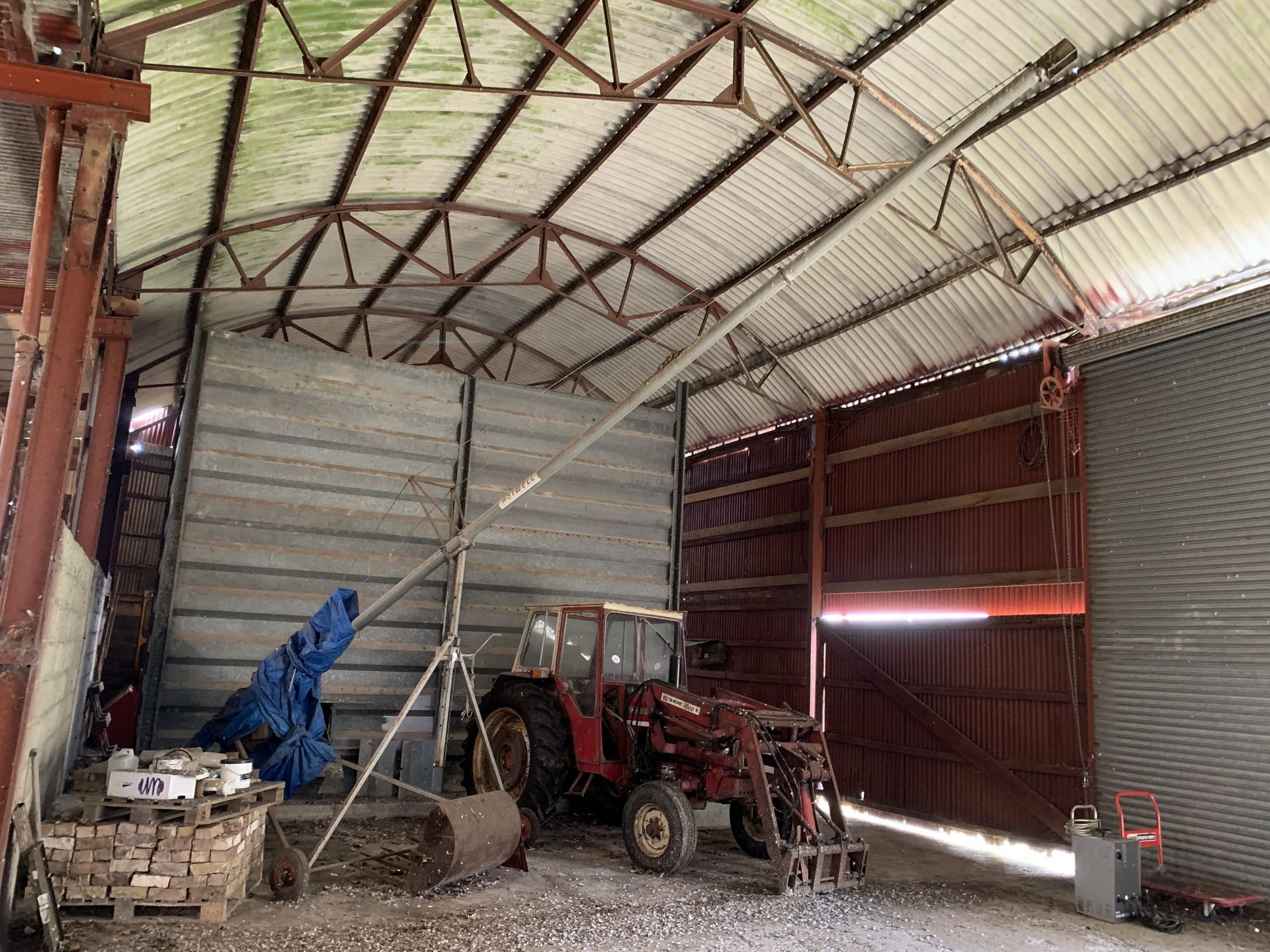 Corn auger on stand