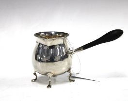 Walker & Hall silver brandy pan, Sheffield 1909, with ebonised handle and four hoof feet, 19cm