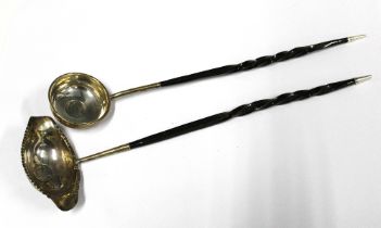 Georgian toddy ladle, white metal coin inset bowl and twisted baleen handle together with another (