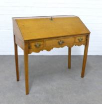 Early 20th century light oak desk, fall front and fitted interior over a single long drawer, 95 x 91
