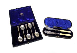 Cased pair of silver butter knives with composite handles, Sheffield 1896 and a set of five
