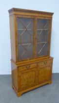 Yew wood glazed cabinet, 103 x 184 x 41cm.