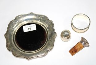 Continental silver coaster with wooden insert, Dutch silver pepper pot and a Dutch silver napkin