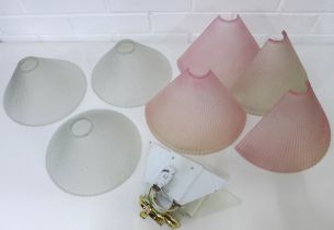 Four pink glass wall shades, 25 x 15cm, together with three frosted glass shades 22 x 10cm and two