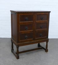 Two door cabinet in the form of a chest of drawers, 71 x 87 x 36cm.
