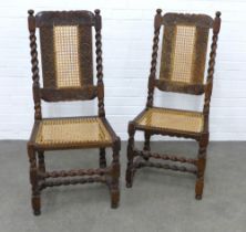 Pair of carved oak chairs with cane work panels and barley twist supports, 50 x 37cm. (2)