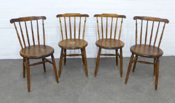 Four similar stick back kitchen chairs, with scrolled top rail an solid seats, 47 x 81 x 39cm. (4)