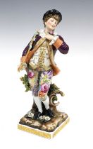 19th century Volkstedt porcelain figure of a Gallant Gent, wearing a puce jacket and floral