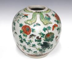 19th century Chinese famille verte vase, painted with butterflies and foliage with an applied bow to