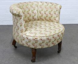 Late 19th century upholstered tub chair, on mahogany legs with brass caps and castors 61 x 55 x