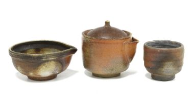 Collection of studio pottery to include a small pot with cover and spout, another without a lid