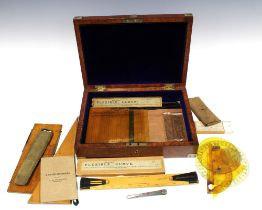 Burr elm box containing a selection of draughtsman equipment, etc. 33 x 23cm