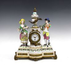 19th century figural porcelain mantle clock with gold anchor mark, (a/f with losses) 39 x 31cm