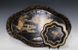 19th century black lacquered papier mache tray, oval outline and painted with chinoiserie river